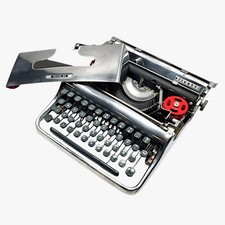 Olivetti Pluma 22 - Limited Polished Silver Edition Typewriter QWERTY thumbnail