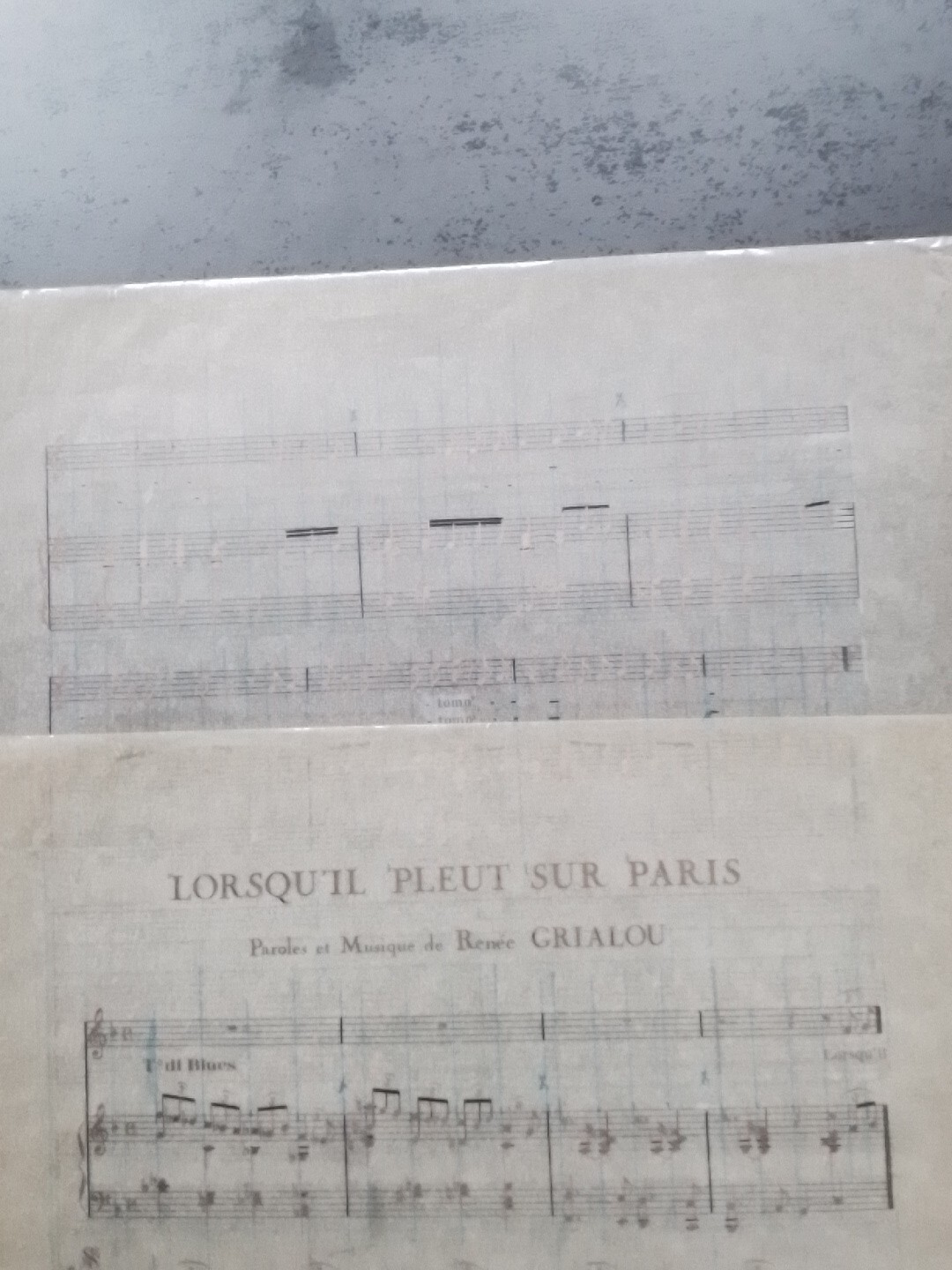 Partition calque Lorsqu'il pleut sur Paris Renee Grialou melodie nostalgique piano chant