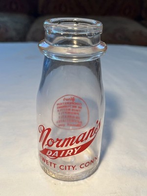 1951 Norman's Dairy Jewett City, Conn. Half Pint Round Red Pyro Milk Bottle