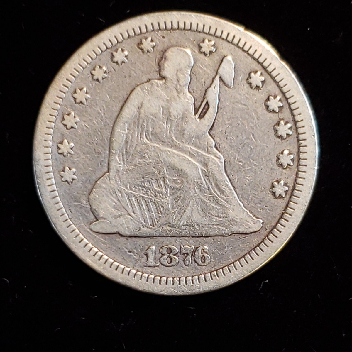 1876-CC Seated Liberty Quart. No rim dings or scratches. Nice
