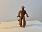 Marx 1950's 60mm Western Cowboy from Roy Rogers playset.  Brown.