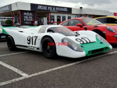 PHOTO  STANDING OUTSIDE THE PIE & PISTON IS DAVE EATON'S WONDERFUL CREATION THE