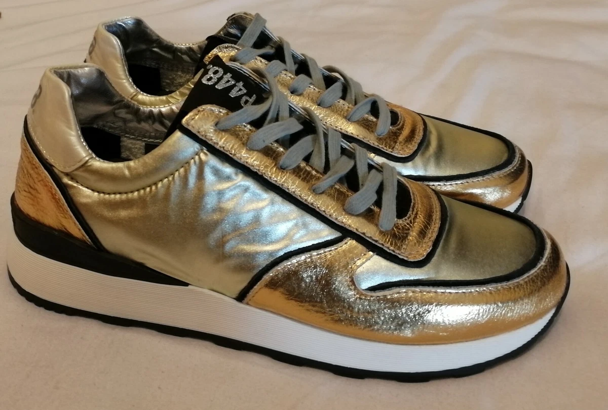 P448 shop gold sneakers