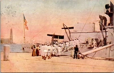 Postcard Sailors Boarding Military Ship and American Flag Posted 1909