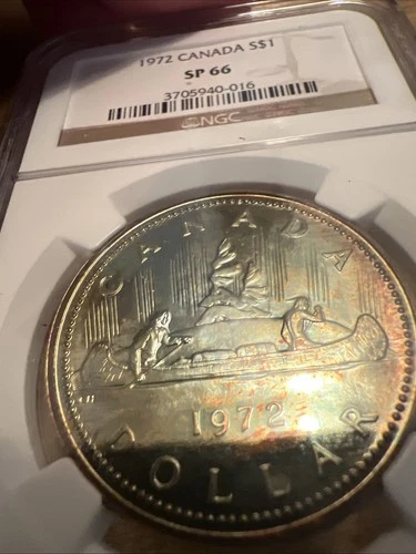 1972 CANADA NGC SP 66 VOYAGER SILVER DOLLAR! NEON GREEN GOLD OBV ! BURGANDY REV!