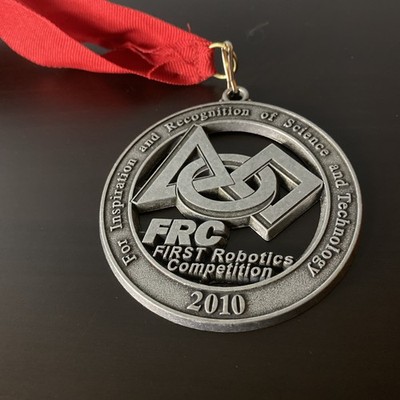 FIRST Robotics Competition (FRC) 2010 Medal Metal with Red Ribbon Silver