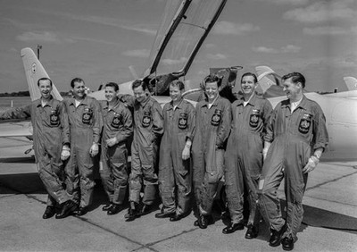 The Red Arrows aerobatics team standing in a row in their flight u- Old Photo