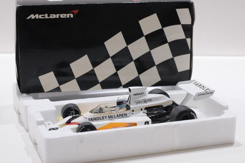 Miniature Minichamps 1:18 McLaren Ford M23 Yardley - Pilote Ickx, GP Allemagne 1973 - Neuf