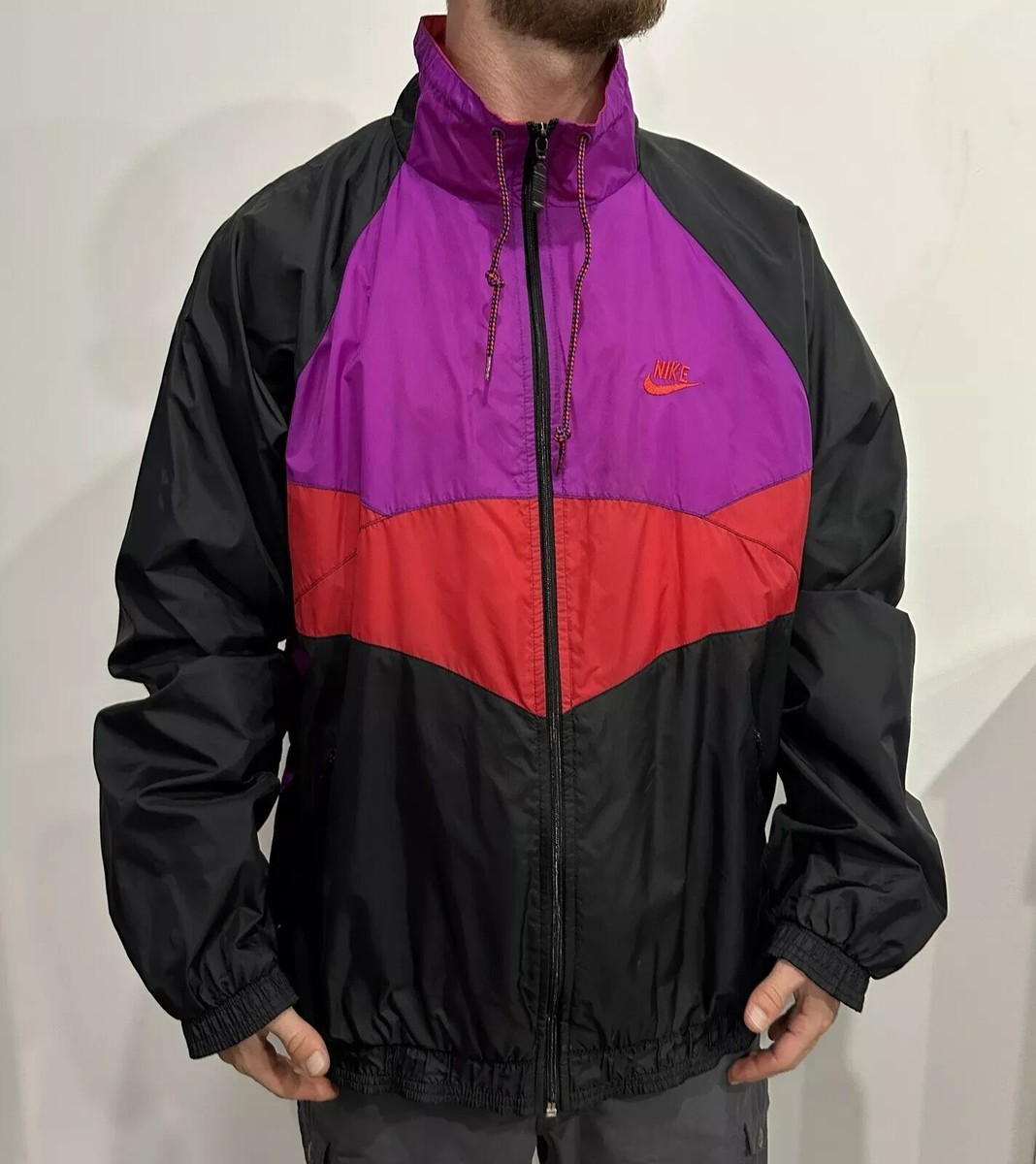 NIKE VINTAGE 1990s TRACK JACKET RAINCOAT NYLON MULTICOLOR NIKE VINTAGE 1990s TRACK JACKET RAINCOAT NYLON MULTICOLOR