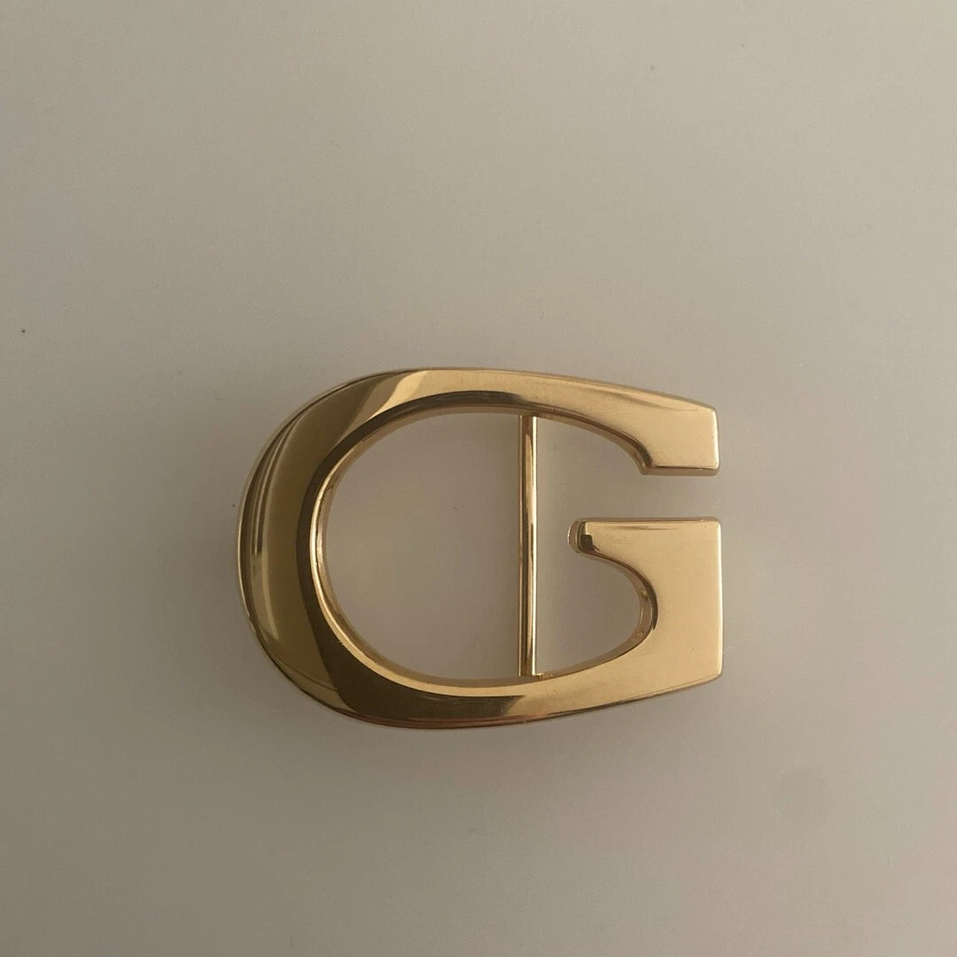 Boucle de ceinture couleur or GUCCI marque G uniquement