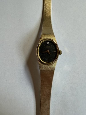 Rare Vintage Womens Pulsar V232-5040 Gold Tone Black Dial Diamond Accent Working