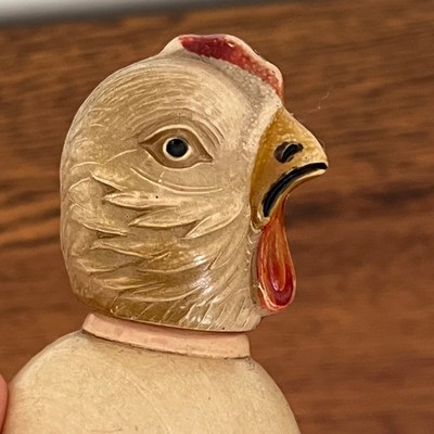 VINTAGE CELLULOID CHICK IN EGG ROLY POLY WEIGHTED WEEBLE WOBBLE TOY