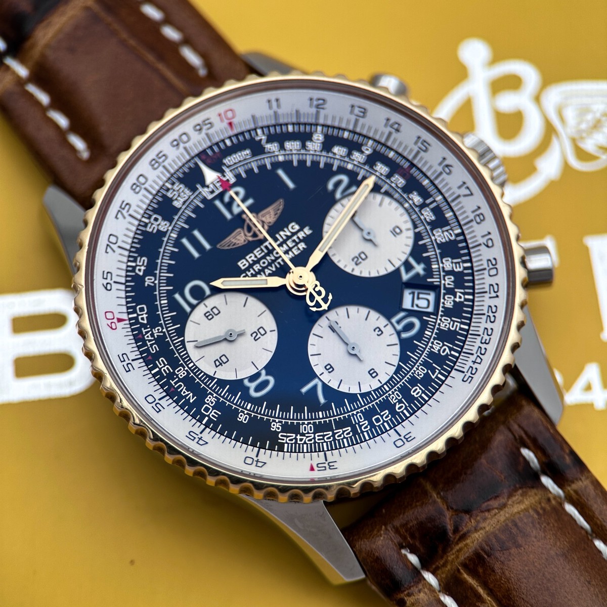 Breitling Navitimer D23322 18k Gold & Black Dial 42mm Full Set