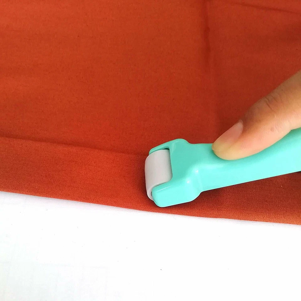 Herramientas de costura enrollar y presionar de trébol para presionar rápidamente costuras que no tiran Foto 2 de 4