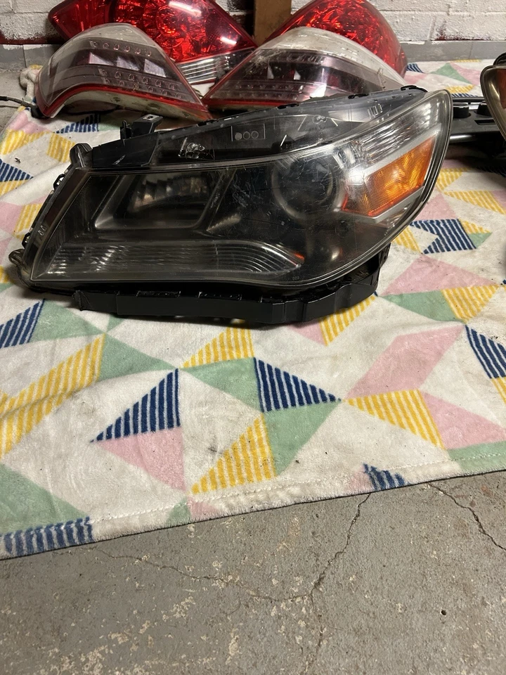 Conjunto de faros de xenón del lado izquierdo del conductor Acura Rl KB2 2009-2012 OEM probado usado Foto 2 de 4