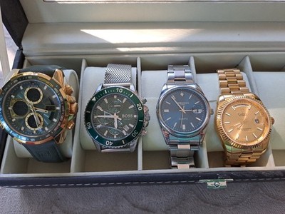 4 Herrenarmbanduhren im Set + Uhrenkasten | Boss, Cadisen, Naviforce