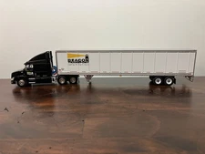 DCP First Gear 1/64th Beacon Transport Midriff Volvo Sleeper and 53' Trailer