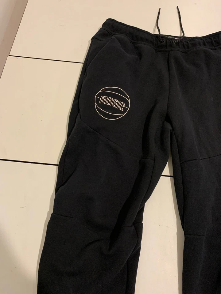 Pantalones deportivos Nike Orlando Magic medianos negros NBA auténticos de vellón retro Foto 2 de 4