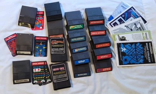 Intellivision Games Lot with heavy duty storage rack