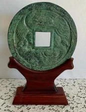 Asian Green Metal Decorative Piece On Wooden Stand