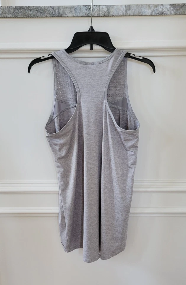 Camiseta sin mangas deportiva Nanette Lepore para mujer perforada Starkey alta-baja espalda de corredor gris Foto 2 de 3