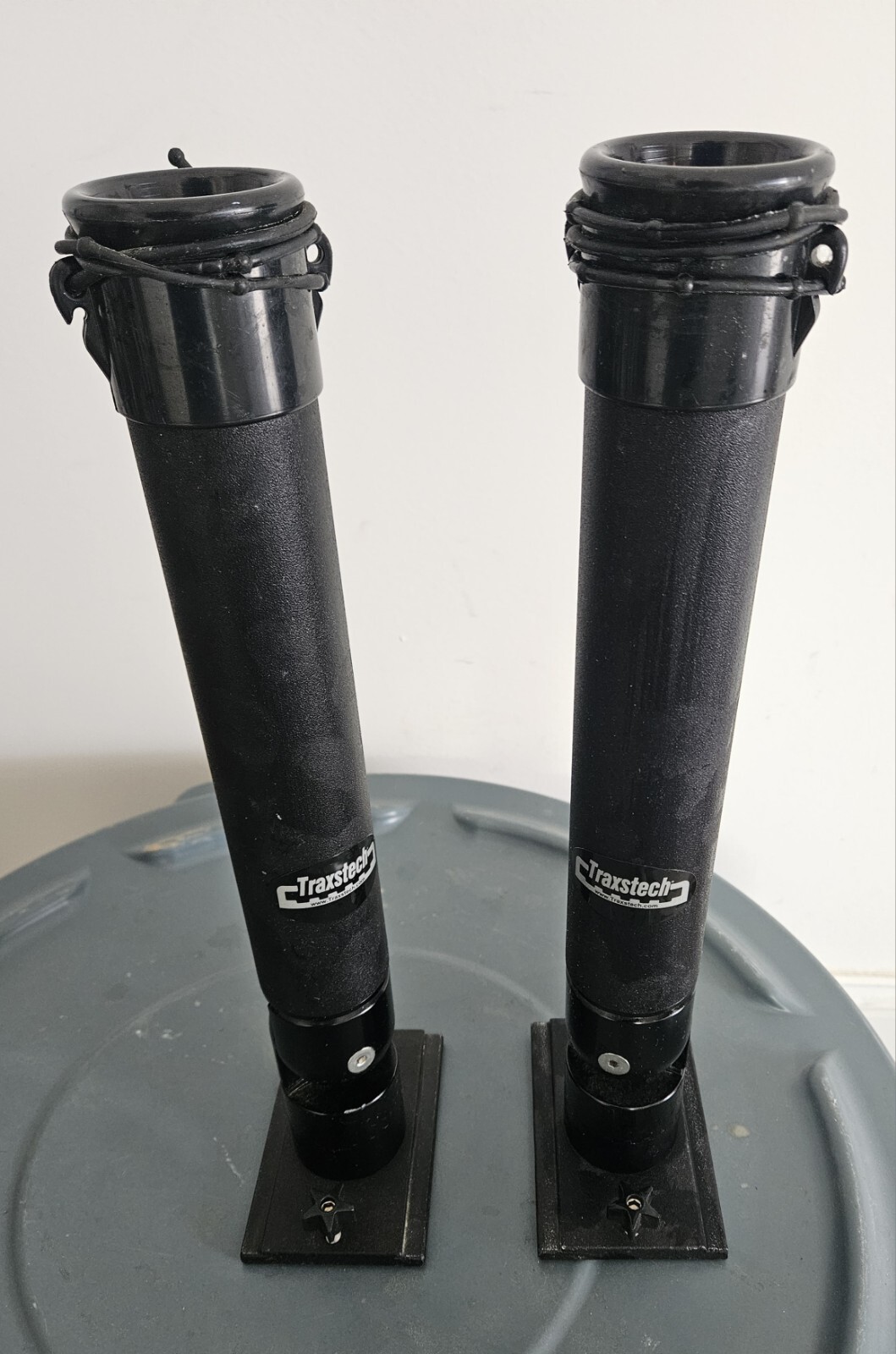 Two (2) Black Traxstech Single Lift & Turn Rod Holder with SlideIn