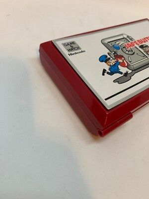 ERROR COVER ON UPSIDE DOWN** NINTENDO GAME & WATCH SAFEBUSTER 1988