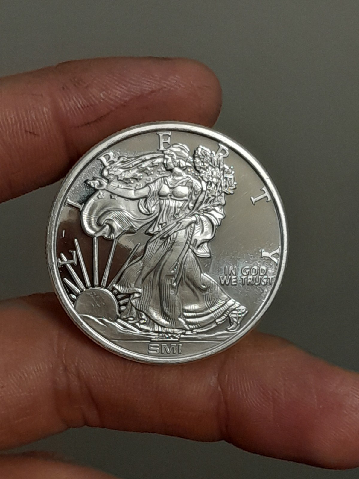1-oz Sunshine Mint Walking Liberty .999 Silver Round Mint Mark SI