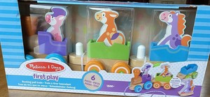 melissa and doug rocking farm animals pull train