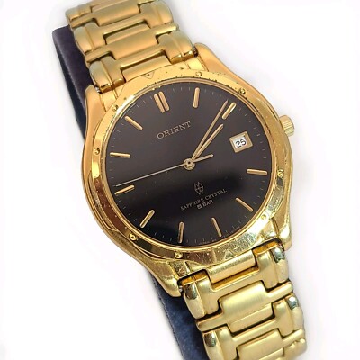 Vintage Orient sapphire crystal Gold Tone Men's Date Quartz Dress watch HT79E1