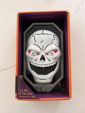 Skeleton Skull Doorbell. Spooky Sounds, lights and surprize Spider Pops Out New 