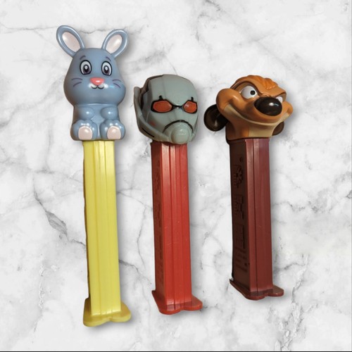 The Lion King Retired Pez Dispensers Timon- Easter Bunny- Ant-Man