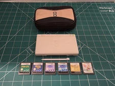 Nintendo DSi Handheld Game Console (Some Discoloring On Front) White