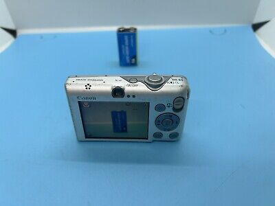 Canon DIGITAL IXUS 95 IS PC1355 10MP Digital Camera. Powers Canon DIGITAL IXUS 95 IS PC1355 10MP Digital Camera. Powers