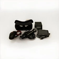 MIXED LOT  Tech Bundle – VR Headset, Gaming Mouse, GPS, Mic, Light