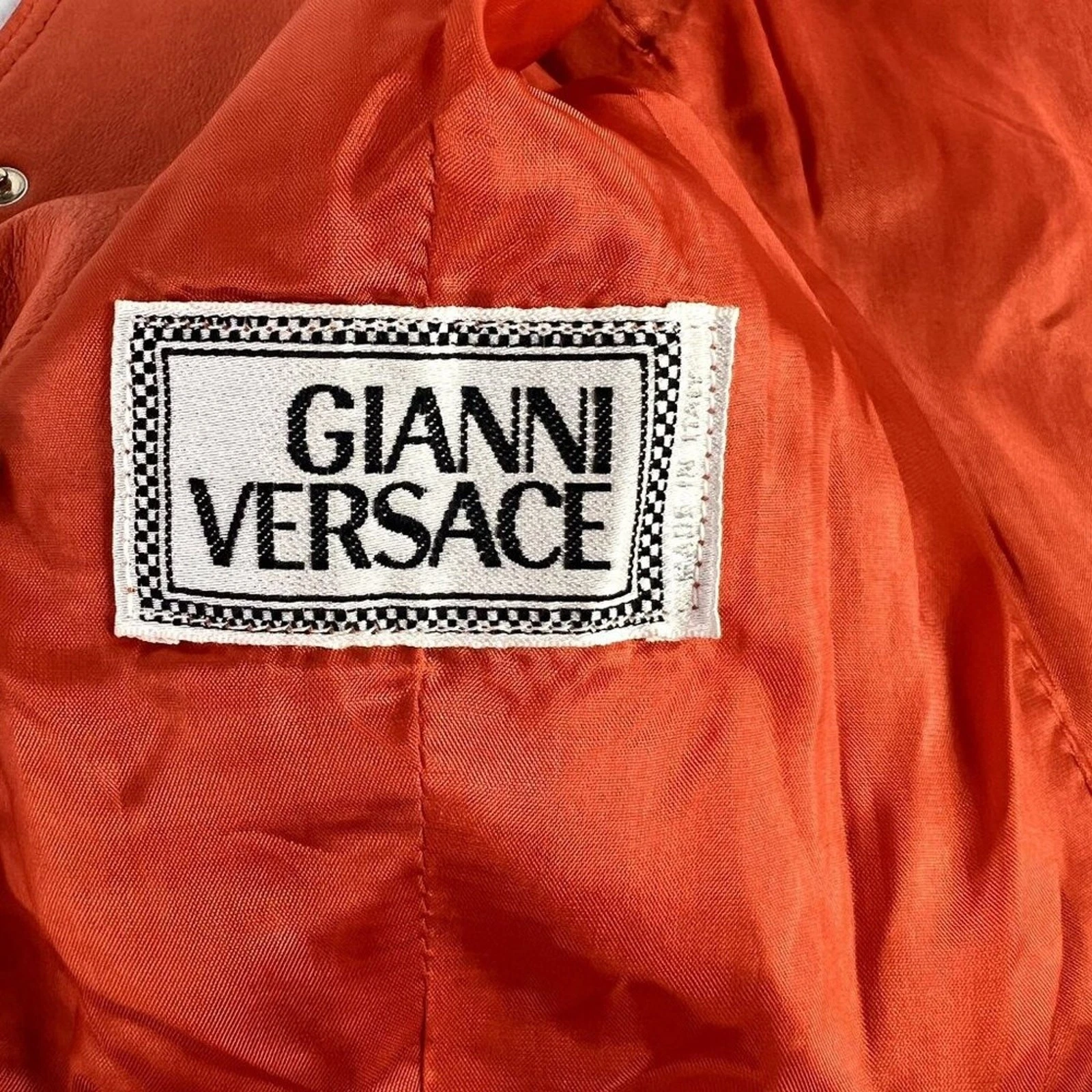 Abito Gianni Versace XS pelle arancione anni 80 bottoni a pressione senza maniche vintage linea A