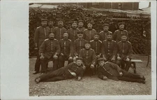 WWI 17 German soldiers ~ ivy wall ~ RPPC real photo postcard