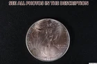 NobleSpirit GEM BU 1986 American SILVER Eagle .999 Fine Some Toning