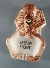KEEP ON SMOKING SKULL SKELETON CERAMIC ASHTRAY MOVING NODDER JAWBONE 1950's VTG