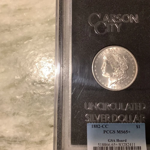 1882-CC Silver Morgan Dollar GSA Hoard PCGS MS65+.