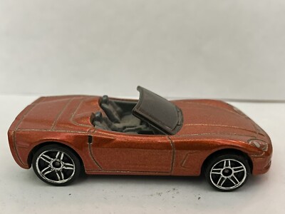 2009 1:64 Hot Wheels New Models 03/42 Corvette C6 Metallic Burnt