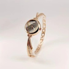 Reloj cuarzo mujer correa acero inoxidable tono dorado elegante novedoso moda