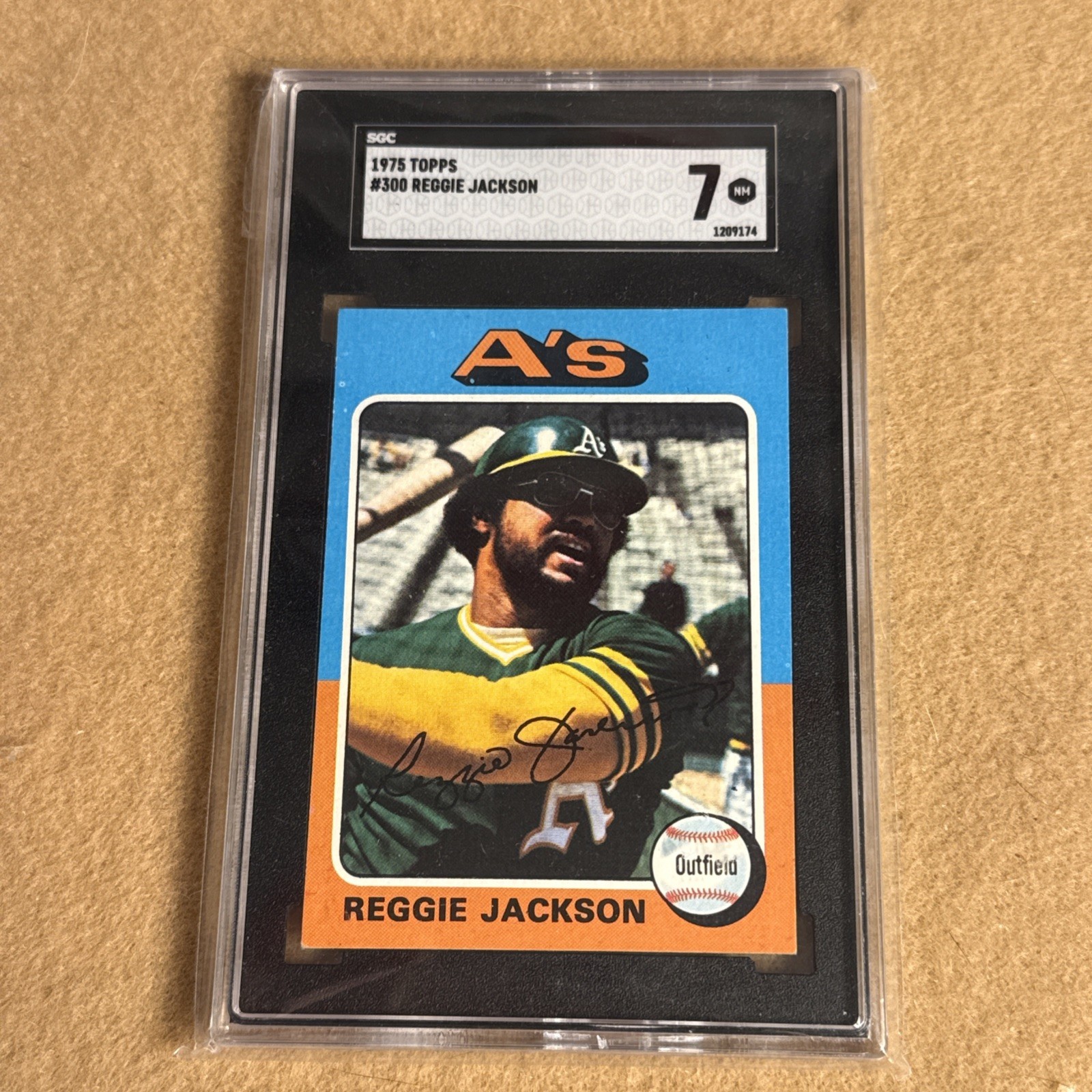 1975 Topps #300 Reggie Jackson SGC 7 Near Mint