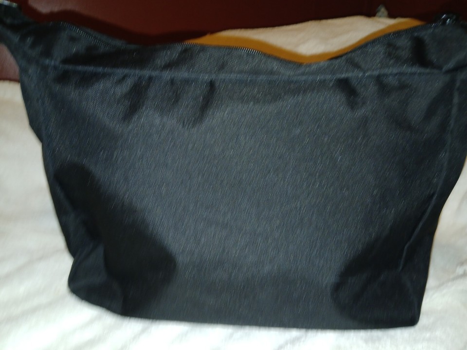 NWOT, 2nd Hand, Previously Owned. Ariat Helmet Riding Duffle Shoulder