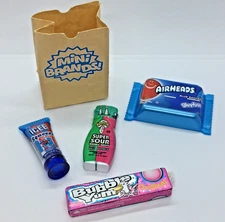 Bag full of Mini Brands Toys Airheads Bubble Yum Warheads Icee Squeeze Paper Bag