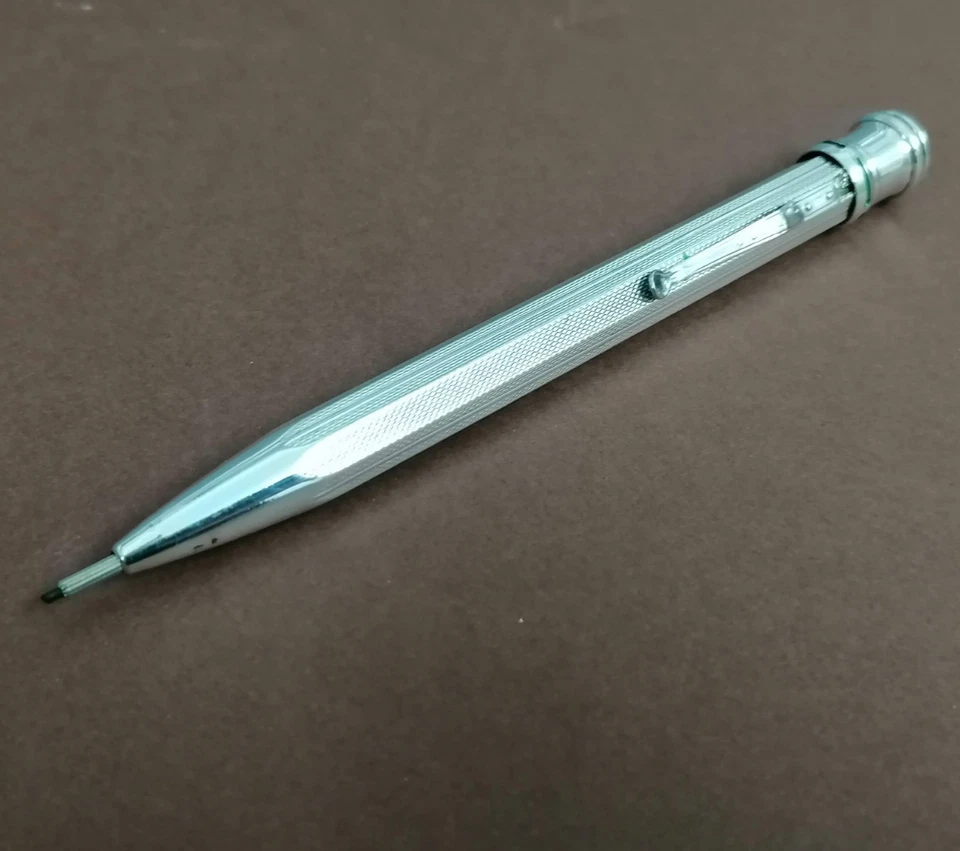 Usus Patent - 4 Farben Drehbleistift - CONZ - Silber - Farbenautomat Antik