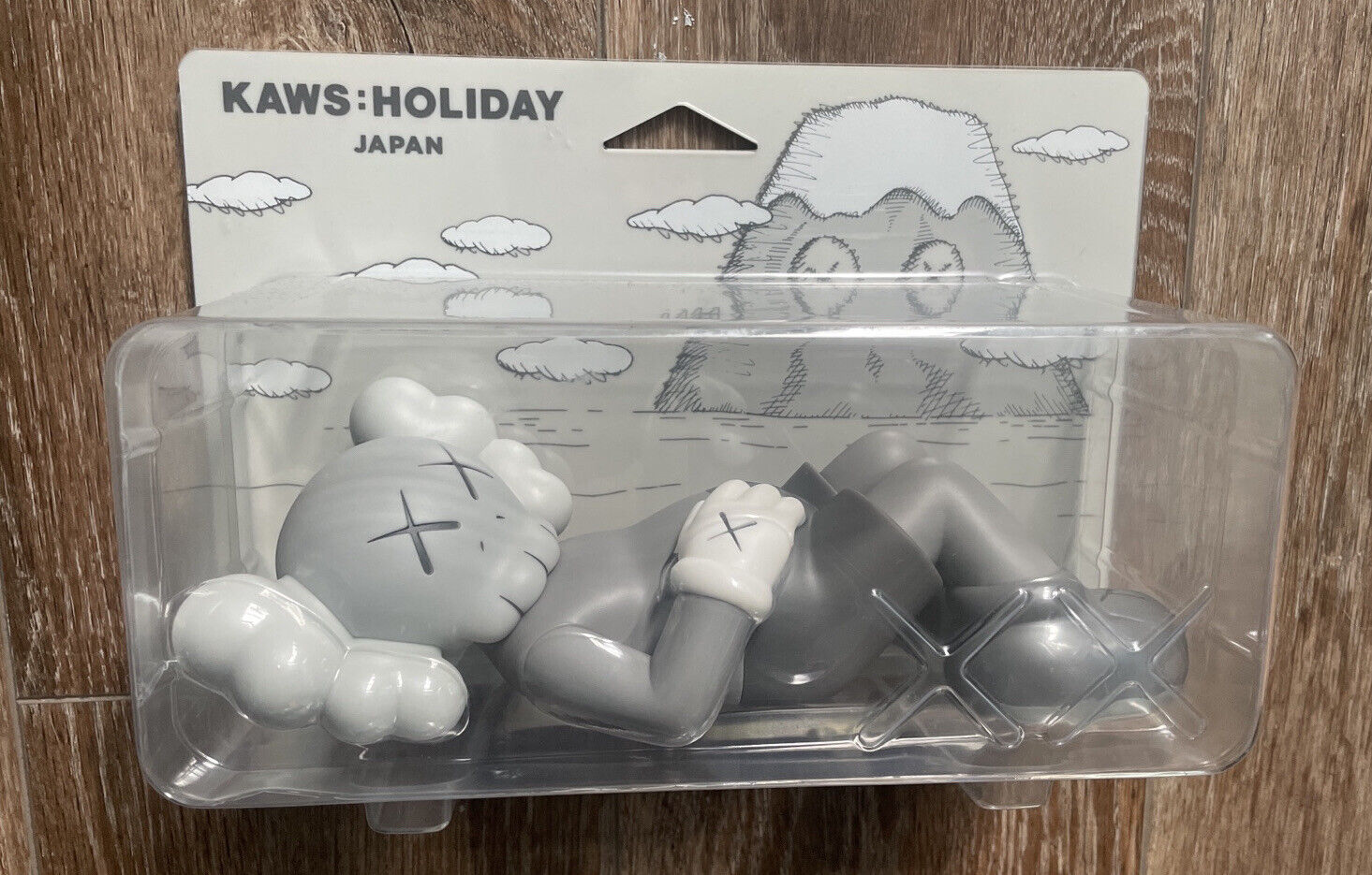 Lot - KAWS (né en 1974) HOLIDAY, JAPAN (BROWN), 2019 Figurine en vinyle,  édition AllRightsReserved Ltd. Dans son emballage d'origine