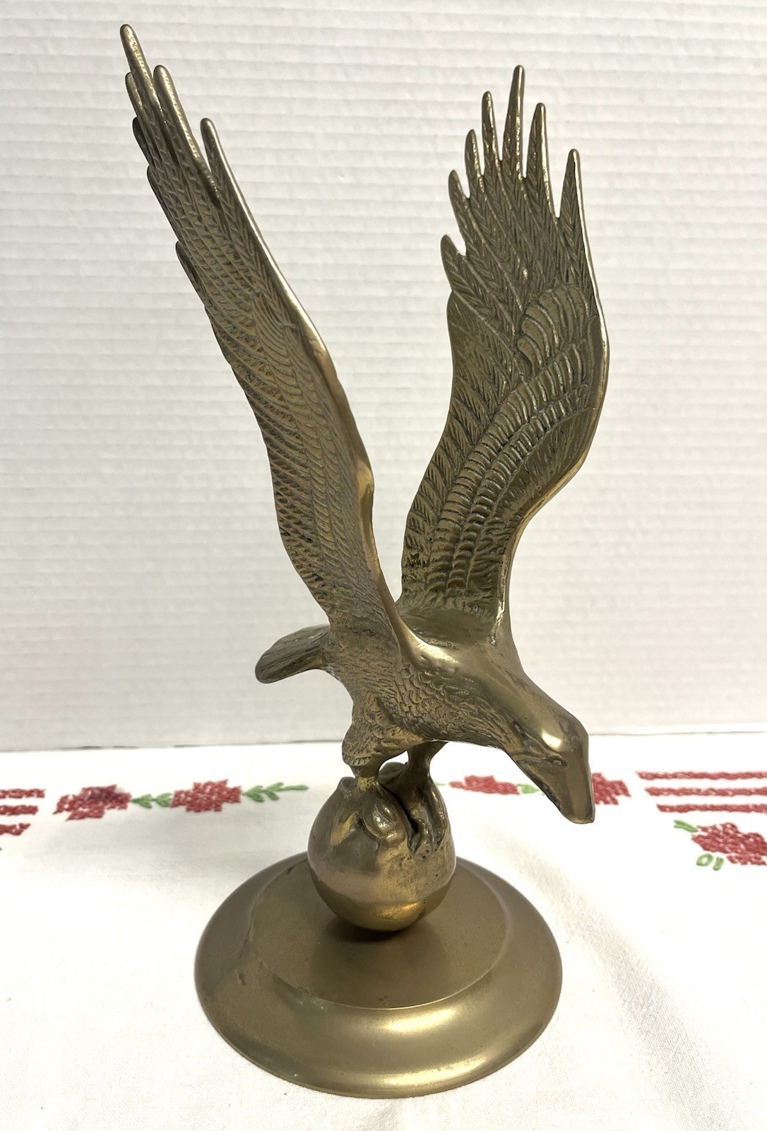 Vintage 11” solid brass eagle statue perched atop a globe Americana decor, vintage figurine