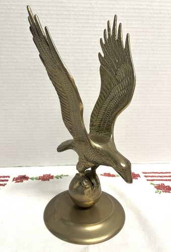 Vintage 11” solid brass eagle statue perched atop a globe Americana decor