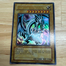 Yu-Gi-Oh! Blue-Eyes White Dragon LOB-001 1st Edition Ultra Asian English LP EX